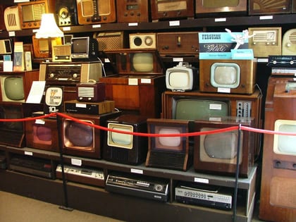 A display of old televisions, VCRs and radios in Amberley Working Museum , England. Tons…