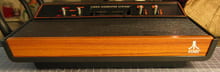A woodgrain CX2600-A. Practically identical to the Light Sixer except for the four switch…